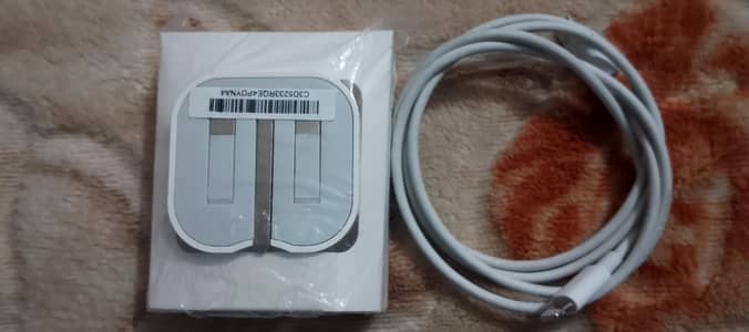Original Genuine iphone 20W Fast Charger just slightly Used Brand New.