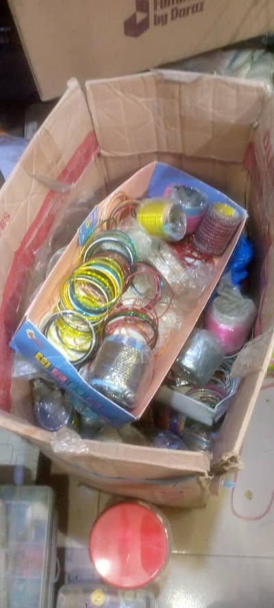Bangles, laces and fancy buttons available for sale