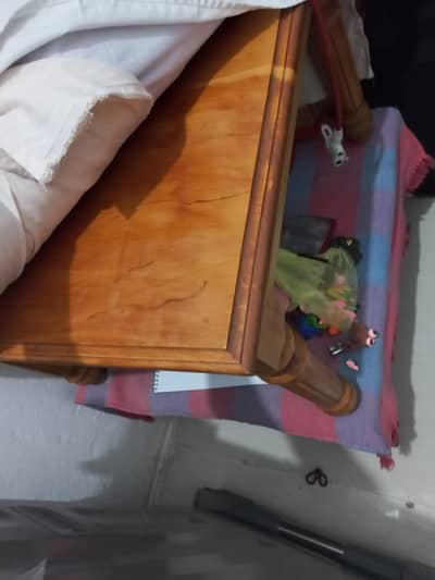 single beds set in dear wood