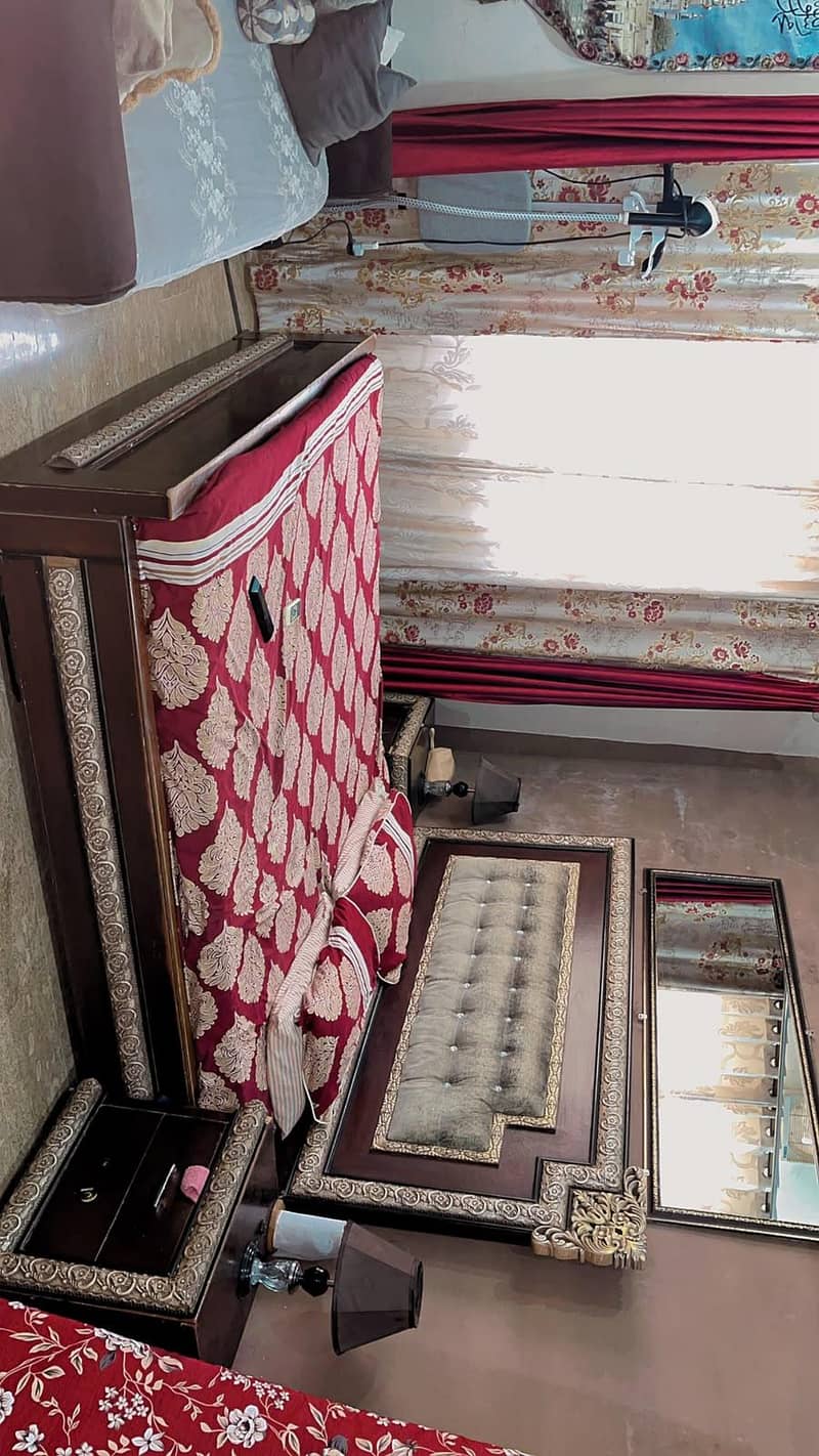 good condition bed with dressing 0