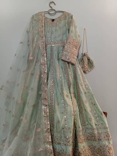 Branded Haseens silk light green maxi with cancan amd potli | Medium