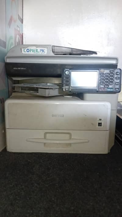 This is a Ricoh Aficio MP 301SPF multifunction printer.