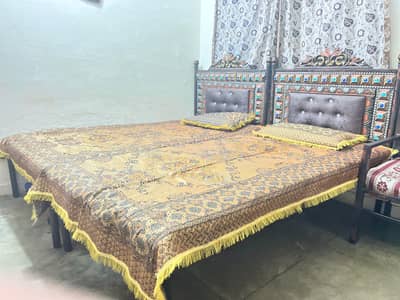 OLX Title:  2 Beds + 4 metal Chairs Set for Sale – Good Condition
