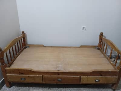 single wooden bed
