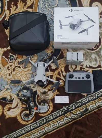 Dji mini 4 pro 3 batteries 45minit with RC2 controller