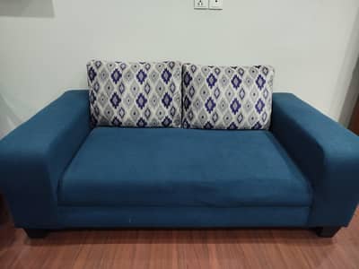 Blue 2 seater sofa ( used)