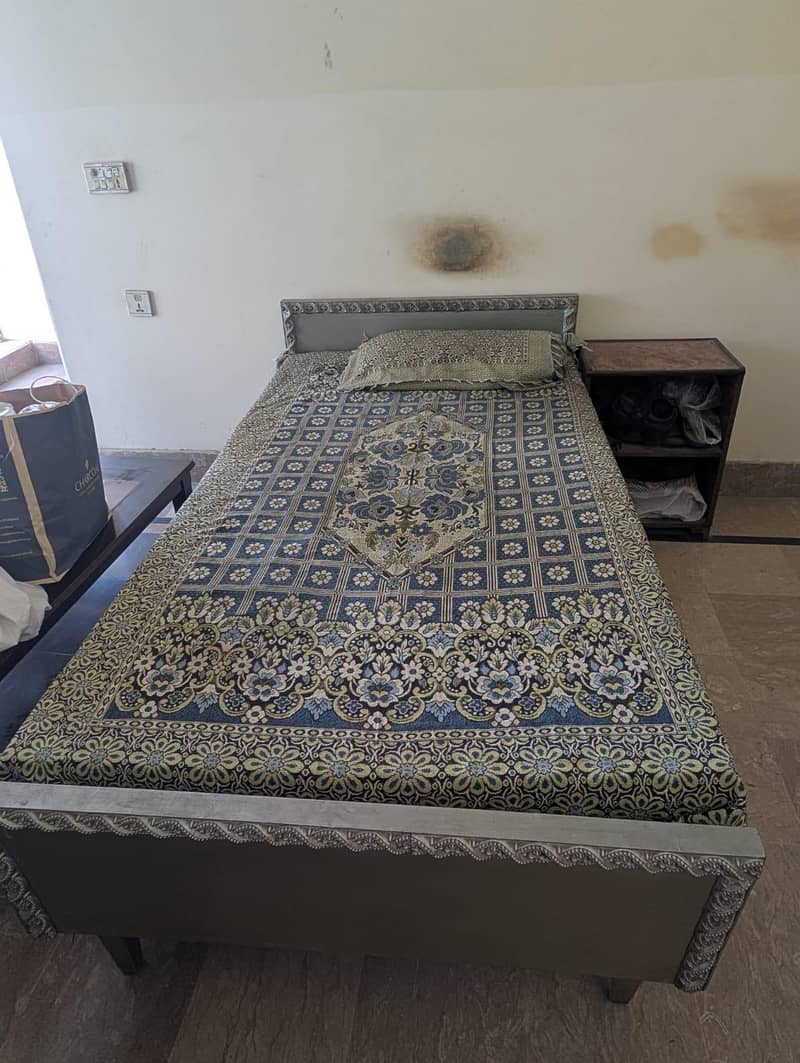 single bed with side table 1