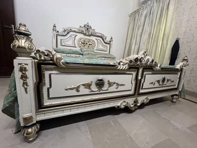 King size bed with dresser and side tables