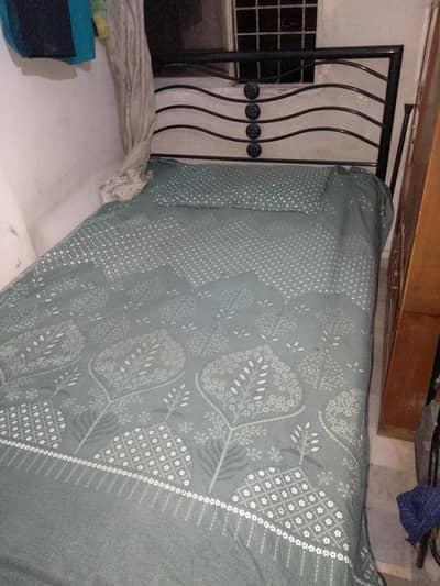 Single Iron bed
