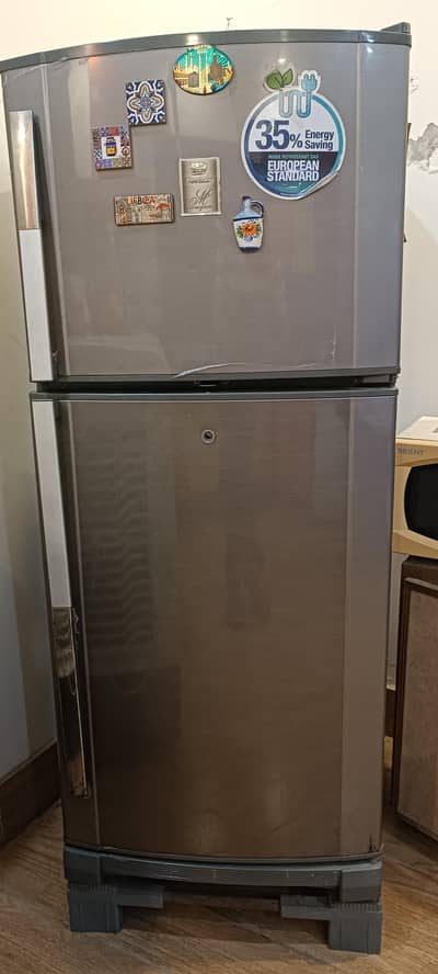 selling medium size dawlance fridge
