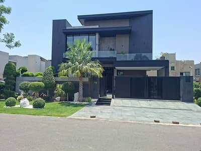SYED BROTHERS PROUDLY OFFERS: 1-Kanal Elegant And Fully Furnished Bungalow With Basement, Pool & Lift Is Available In The Best Block Of DHA Lahore.