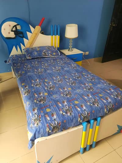 designer bed with side table