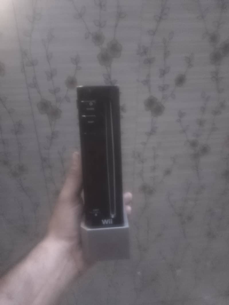Wii console with controller 0