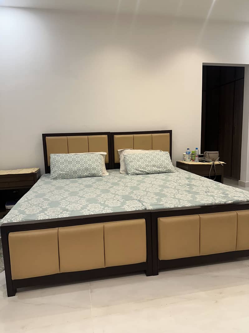 2 Single bed with a side table 1