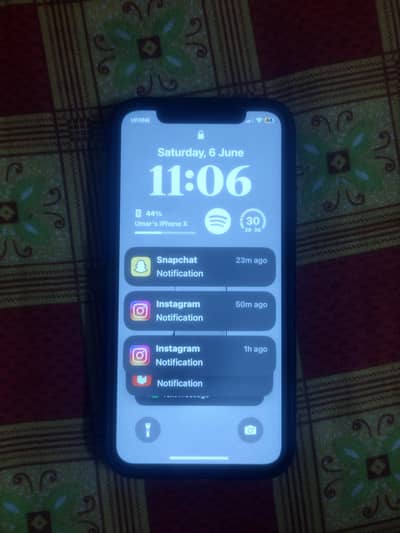 Apple iPhone X with 6 cases