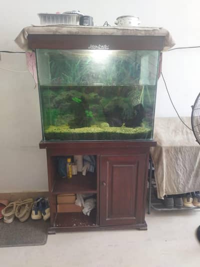 fish aquarium with table available for sale