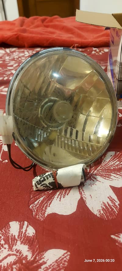 GS150SE Original headlight with spare bulb