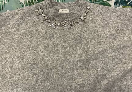 ON . 34 th ladies sweater freshly imported from Macy’s usa.