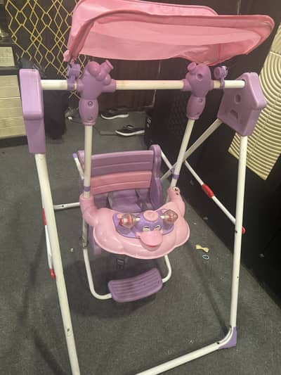Kids swing pink and purple