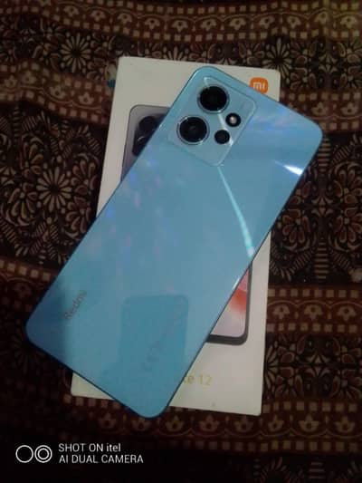 REDMI NOTE 12 WITH BOX AND ORIGINAL CHARGER