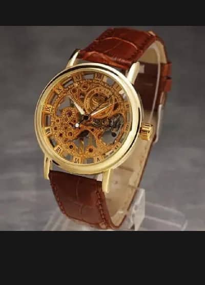 men watch / new style watch / golden colour watch / low rate