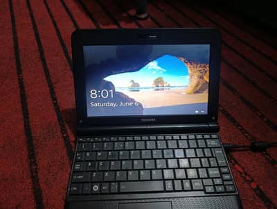 TOSHIBA LAPTOP COR 2  WITH CHARGER