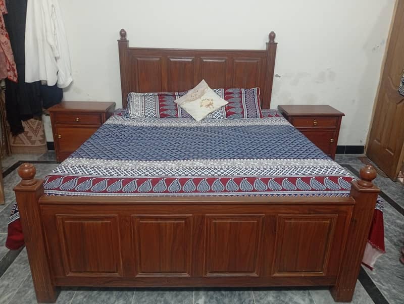 double bed with side table 0