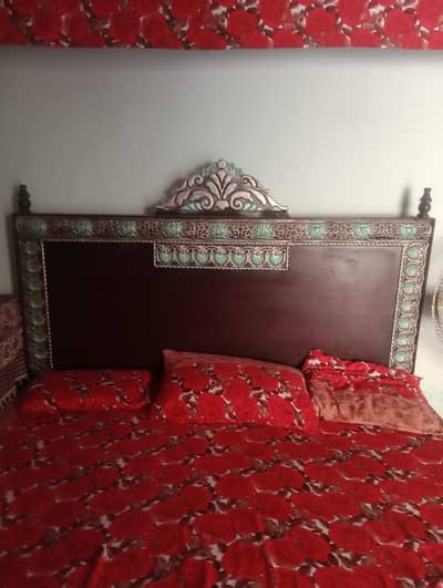 wooden double bed