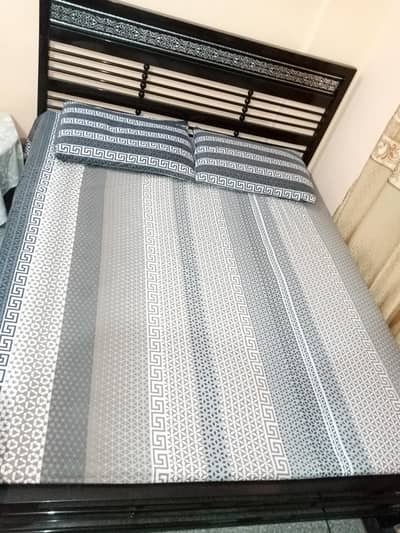 Iron bed with mattress