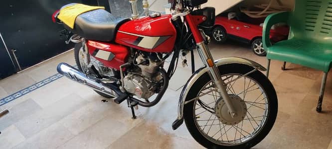 Honda 125 red colour sell 2024 madal  Islamabad number neat& clean