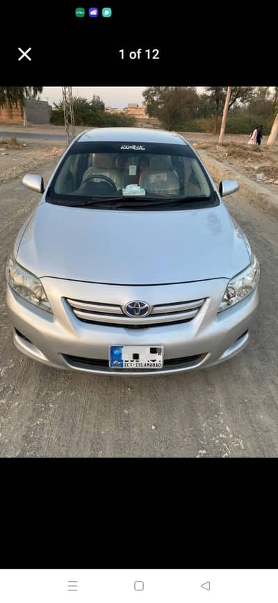 Toyota Corolla GLi 1.3 VVTi (White silver) 10 Model
