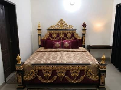 black golden meroon bed 