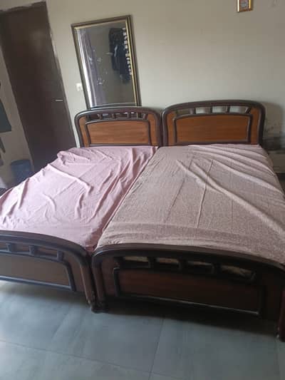 two single beds solid wood with Canon Mattress