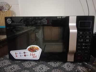 new microwave oven with grill,glass plate and  box packing as well