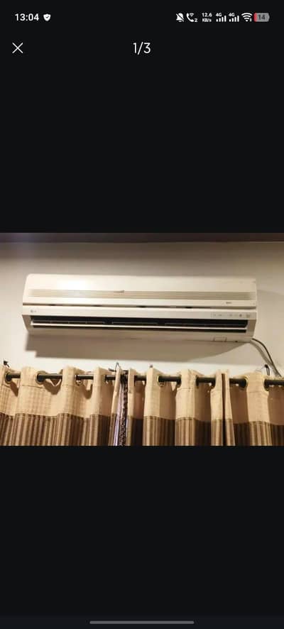 1.5 ton lg gold Ac in working condition