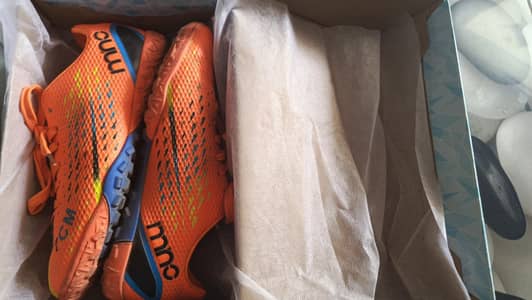 1 Time used Football Shoes.