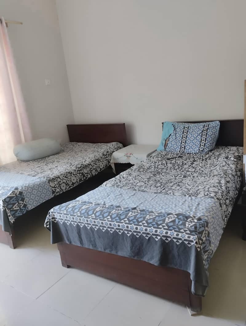 solid single bed pair 1