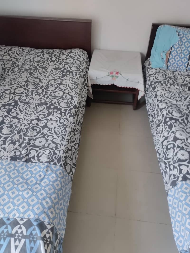 solid single bed pair 2