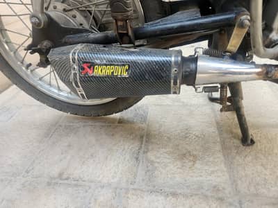 Akrapovic shark Exhaust with 70 bend pipe with fire kit