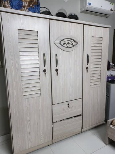 cupboard and double bed