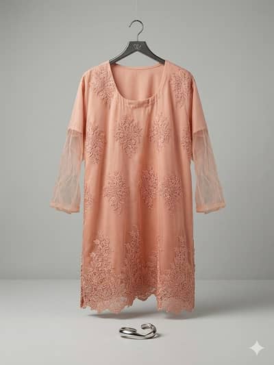 orange net shirt with off white gharara and dupatta