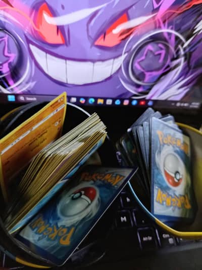 100 original Pokemon cards and metal poke ball