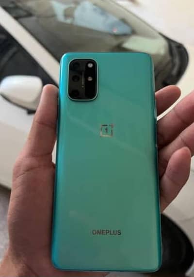 One Plus 8T 12/256 mobile and charger