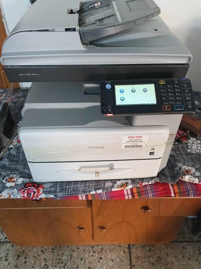 Ricoh mp 301 In excelent Condition Only serious buyers Contact me
