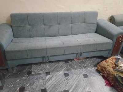 sofa come bed and two setties