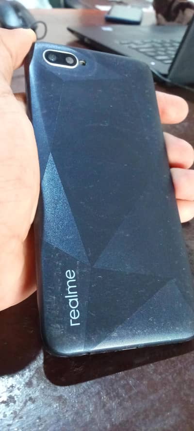 Realme C2 3/64 official pta approved All ok set he koi issue nh h .