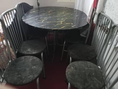 dining table set with a heavy steel frame and 6 chairs
