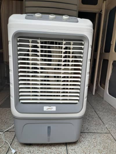 220 volts Air cooler with cooling pads. 6 months warranty available