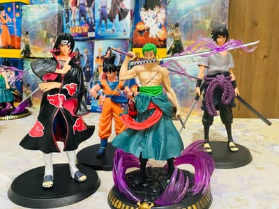 Zoro itachi sasuke and goku action figure
