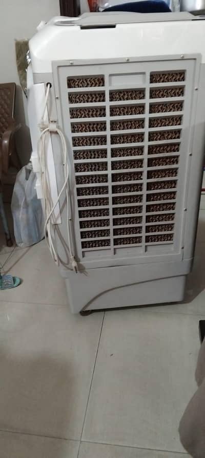Room cooler in good condition with ice bottles